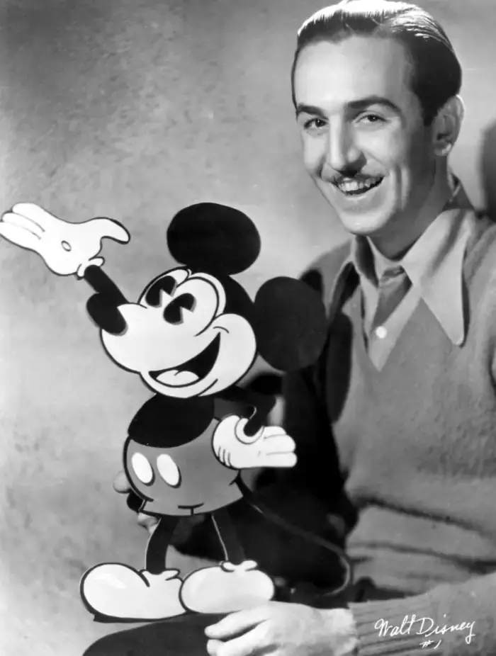Walt Disney with Mickey Mouse character